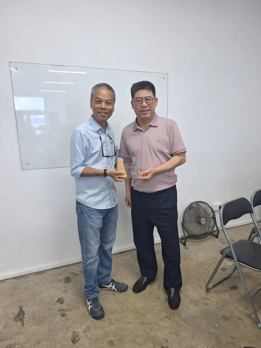 Polytroniks receiving the WIIP Gold Service Partner award